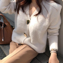 Blusa Cardigan Button use o cupom PRIMEIRACOMPRA e garanta 12%OFF