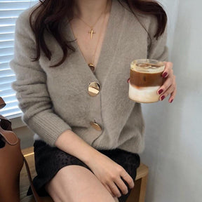 Blusa Cardigan Button use o cupom PRIMEIRACOMPRA e garanta 12%OFF