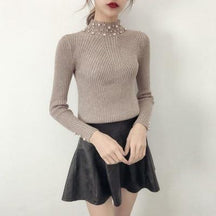 Blusa Manga longo com detalhes em Pérola use o cupom PRIMEIRACOMPRA e garanta 12%OFF