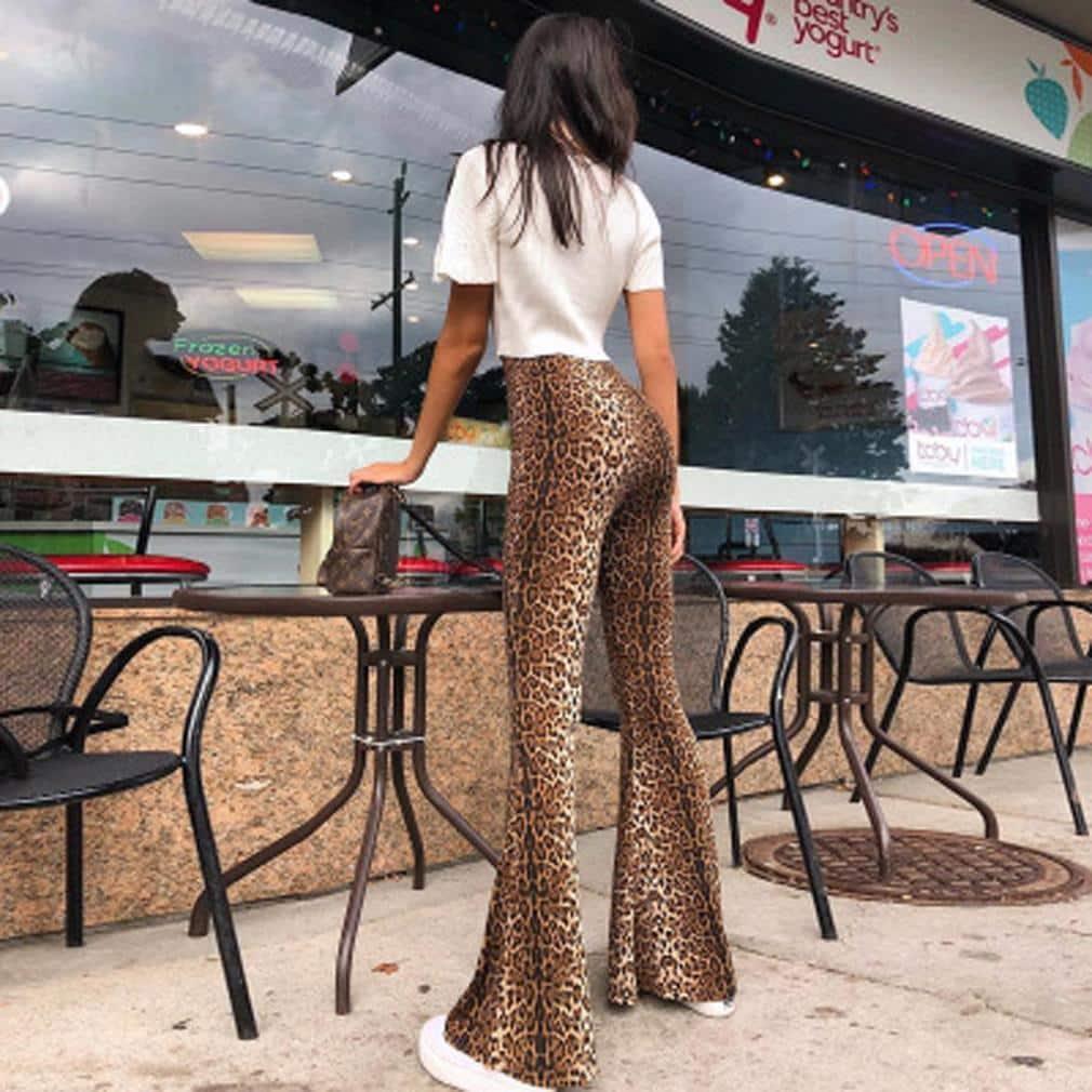 Calça Cintura Alta Animal Print use o cupom PRIMEIRACOMPRA e garanta 12%OFF